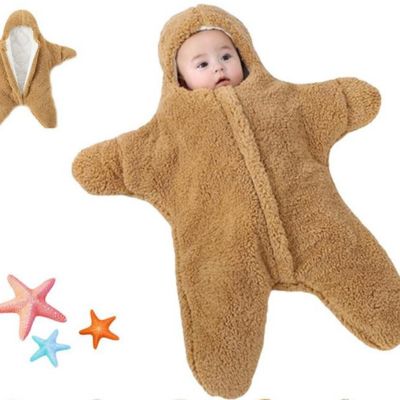 bébé dans nid d'ange cosy marron étoile