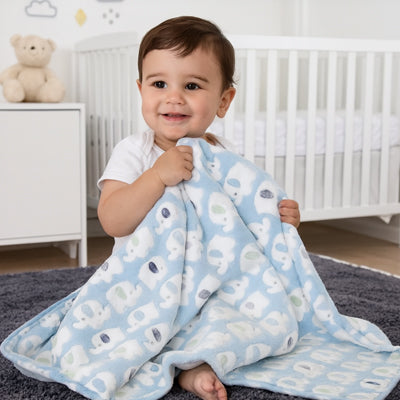 bébé et sa couverture bebe éléphanteau