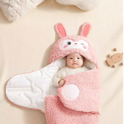 bébé au chaud dans nid d'ange cosy lapinou