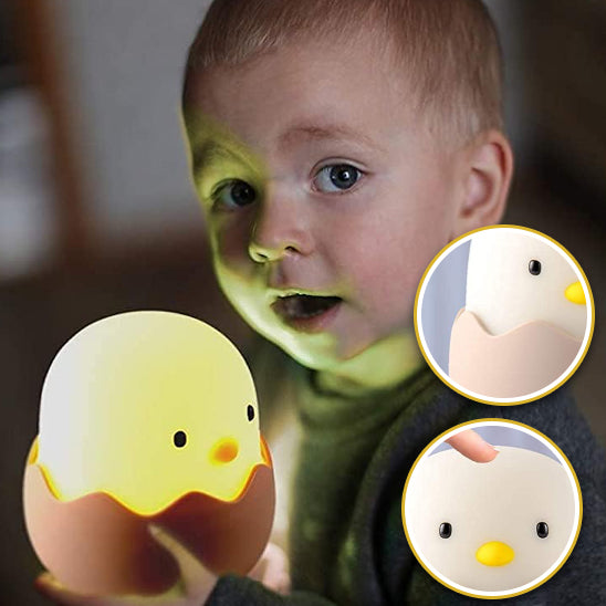veilleuse bébé étonné